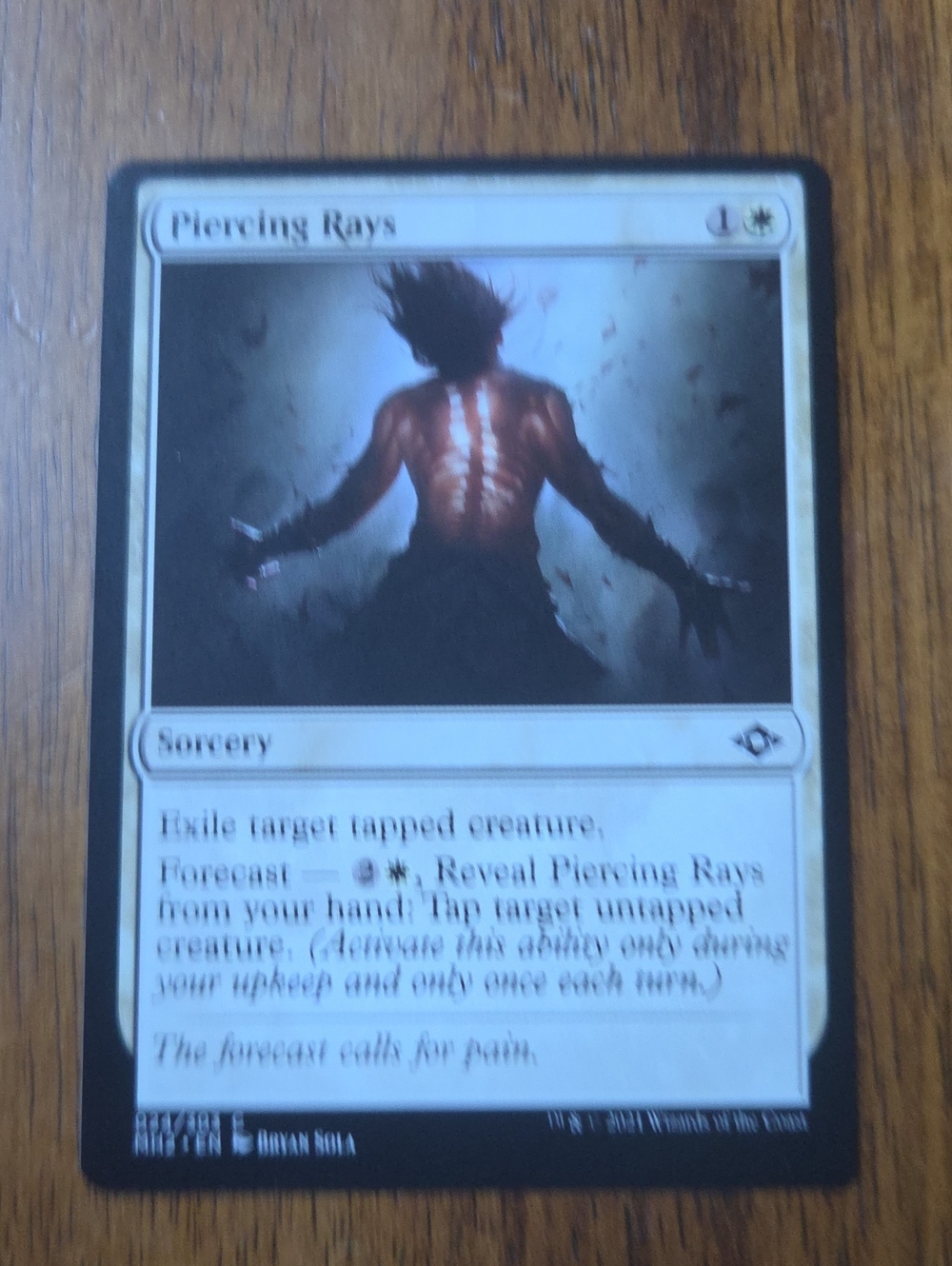 Magic: The Gathering Piercing Rays - White Sorcery Card